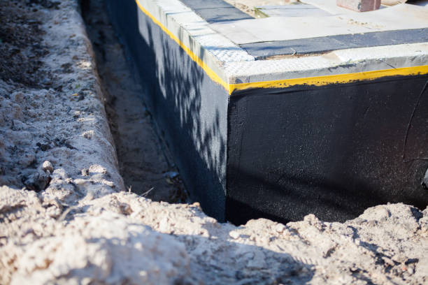 Professional Waterproofing technician working in Brooklyn, MI